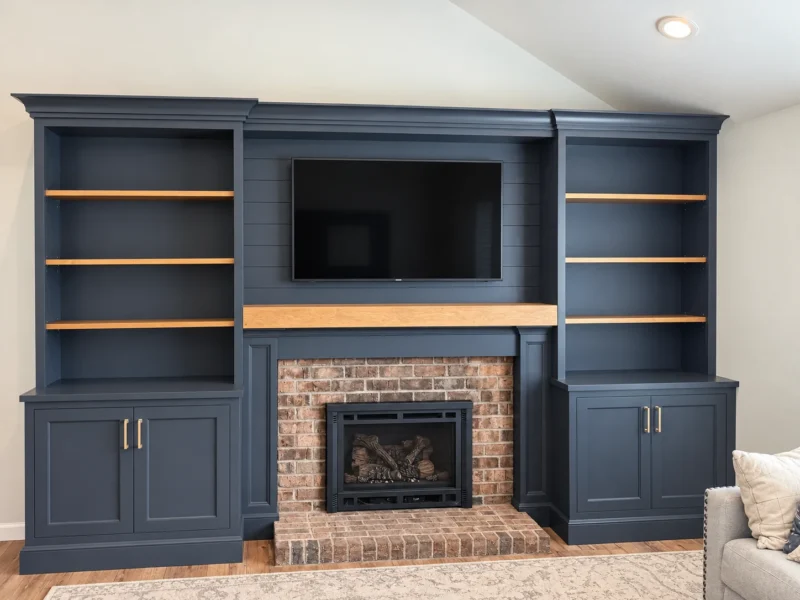 Wall unit and mantle surround · stained maple mantle and shelving&nbsp;· slate painted finish